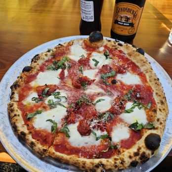 Brickery Pizza - Margherita style with bottled root beer - Pizza Near Me - Mendocino, California Brickery Pizza - Margherita style with bottled root beer - Pizza Near Me - Mendocino, California