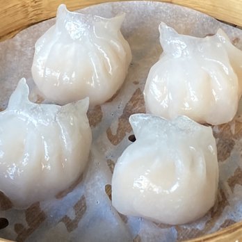 District Kitchen - steamed dumplings in a bamboo basket - Chinese Near Me - Malden, Massachusetts District Kitchen - steamed dumplings in a bamboo basket - Chinese Near Me - Malden, Massachusetts