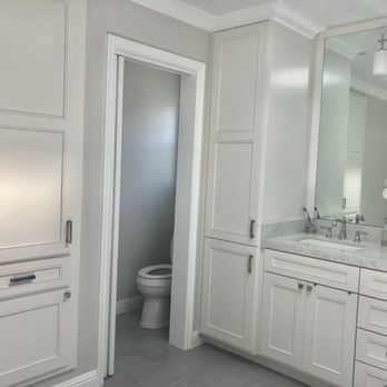 TG Construction - a bathroom with white cabinets and a toilet - General Contractors Near Me - Sunnyvale, California TG Construction - a bathroom with white cabinets and a toilet - General Contractors Near Me - Sunnyvale, California