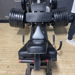 Body Xchange - Someone doesn't know how to rerack their weights. Keep in mind seniors workout here too and would have to rerack this mess.