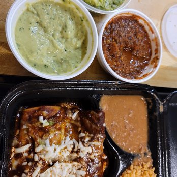 Chavez Mexican Cafe - Mexico Enchilada Dinner, Mole sauce was good, as well as beans & rice.  Chips are thin and side dips delish. The side of guac was very fresh - Mexican Near Me - Houston, Texas