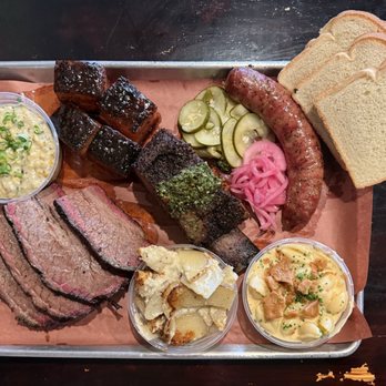 Interstellar BBQ - 1/2 peach tea belly 1 pound brisket 1 link 3/4 pound short ribs Scallop potatoes Mac and cheese Poblano cream corn - Barbeque Near Me - Austin, Texas Interstellar BBQ - 1/2 peach tea belly 1 pound brisket 1 link 3/4 pound short ribs Scallop potatoes Mac and cheese Poblano cream corn - Barbeque Near Me - Austin, Texas
