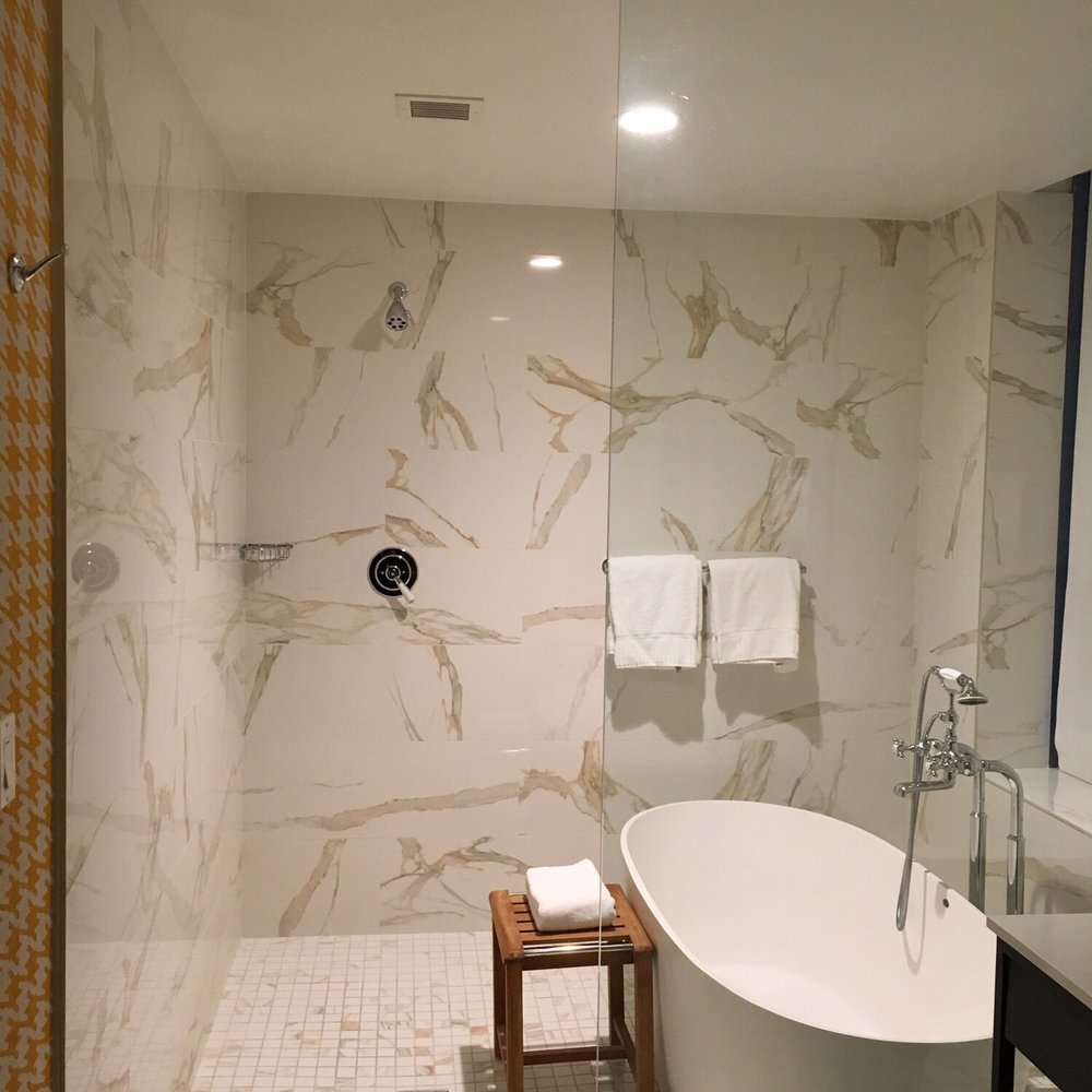 Kimpton Hotel Monaco Pittsburgh - Bathtub/Shower in the corner king spa room. - Hotels Near Me - Pittsburgh, Pennsylvania Kimpton Hotel Monaco Pittsburgh - Bathtub/Shower in the corner king spa room. - Hotels Near Me - Pittsburgh, Pennsylvania