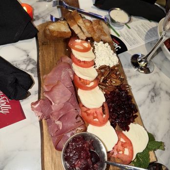 Puttery - Holly Jolly Pop Up Menu: Christmas charcuterie - Mini Golf Near Me - Houston, Texas