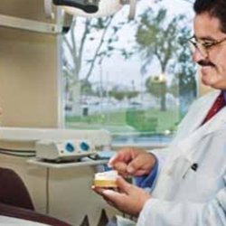 Rodolfo R Burquez, DDS - Dr Burquez explaining some dental Work to my mom.