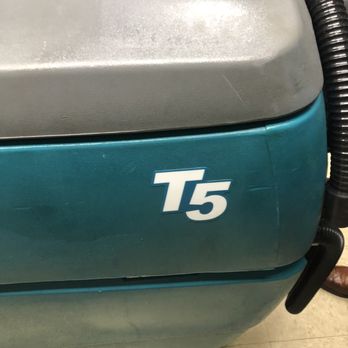 Premier Building Maintenance - Tennant T5 autoscrubber used to service floors at local customer account - Office Cleaning Near Me - Wixom, Michigan Premier Building Maintenance - Tennant T5 autoscrubber used to service floors at local customer account - Office Cleaning Near Me - Wixom, Michigan