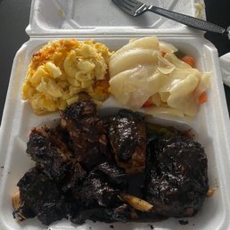 Jerk Chicken Dark, Mac and Cheese, Steamed Cabbage