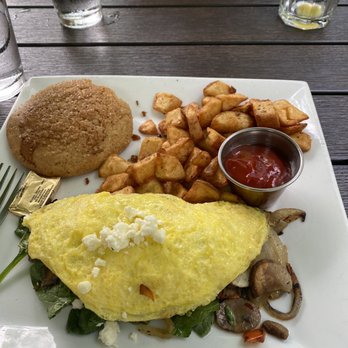 Greenleaf Restaurant - Ashlanditan omelette with roasted potatoes and lemon poppy seed scone - Breakfast & Brunch Near Me - Ashland, Oregon Greenleaf Restaurant - Ashlanditan omelette with roasted potatoes and lemon poppy seed scone - Breakfast & Brunch Near Me - Ashland, Oregon