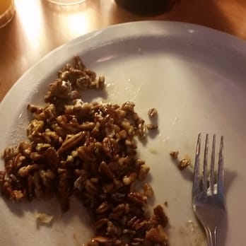Millbrae Pancake House - All the left over pecans.  There were more pecans than waffle. - American Near Me - Millbrae, California