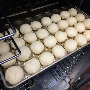 Raymond's Pizzeria - Photo courtesy of IG @raymondspizzeria. Slider buns in the oven. - Pizza Near Me - Richmond, California Raymond's Pizzeria - Photo courtesy of IG @raymondspizzeria. Slider buns in the oven. - Pizza Near Me - Richmond, California