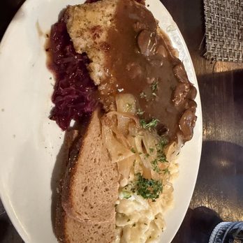 Alpine Inn - Pork schnitzel with gravy, spatzel, sauerkraut, bread - German Near Me - Hill City, South Dakota Alpine Inn - Pork schnitzel with gravy, spatzel, sauerkraut, bread - German Near Me - Hill City, South Dakota