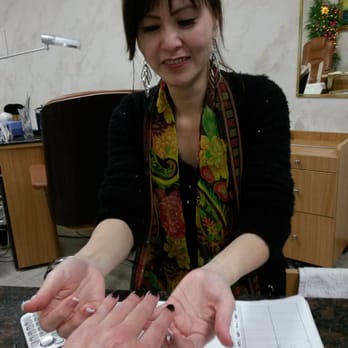 Nail Design - Jenny inspecting the final product. Yay - Nail Salons Near Me - Carlsbad, California