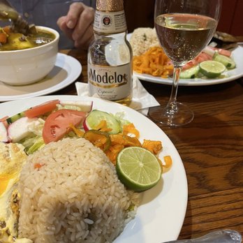 La Perla De Oriente Restaurante - a plate of food and a glass of wine - Spanish Near Me - Valley Stream, New York La Perla De Oriente Restaurante - a plate of food and a glass of wine - Spanish Near Me - Valley Stream, New York