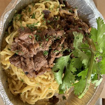 Nguyen's Kitchen - Garlic noodles with bulgogi. // Instagram: @nicoleeatsla - Vietnamese Near Me - Orange, California