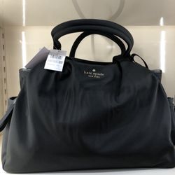 Kate Spade - Is that a $500 ( hope for an even bigger sale) tote? In nylon not leather? yup.