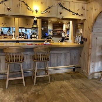 Swiss Chalet Restaurant - a bar with two chairs - German Near Me - Vail, Colorado