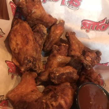 St. Louis Bar & Grill - My redone, crispy, well done wings. Finally after having the manager argue with me for over 15 minutes...crazy!!! - Sports Bars Near Me - Brampton, Ontario St. Louis Bar & Grill - My redone, crispy, well done wings. Finally after having the manager argue with me for over 15 minutes...crazy!!! - Sports Bars Near Me - Brampton, Ontario