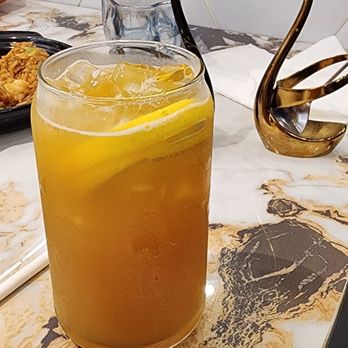 JIYU Thai Hot Pot - a drink in a glass with a spoon - Seafood Near Me - Markham, Ontario
