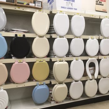 Ed Youngs Ace Hardware - Lots of toilet seat covers to choose from! I like the black one myself - Plumbing Near Me - Williamsville, New York