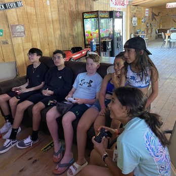 Buckhorn Bar & Grill - Kids playing video games - New American Near Me - Leakey, Texas