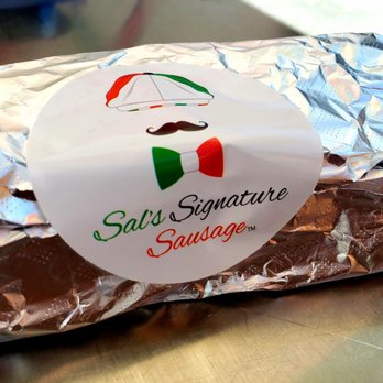 Sal's Signature Sausage - a sandwich wrapped in foil - Food Stands Near Me