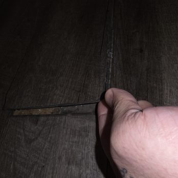 Empire Today - LVP planks lifting up. - Carpet Installation Near Me Empire Today - LVP planks lifting up. - Carpet Installation Near Me