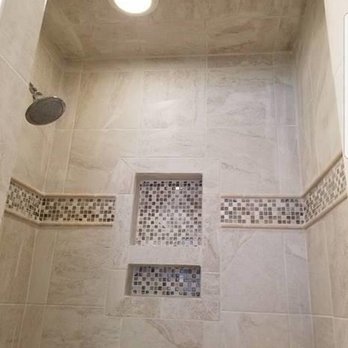 Cassidy Improvements and Construction - a tiled shower - Flooring Near Me