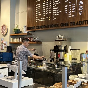 Caffe Umbria - Mario serving up great lattes and pastries. - Coffee & Tea Near Me - Seattle, Washington