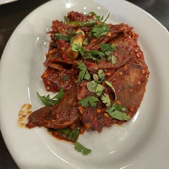 Himalayan Yak - Dish Name: Cheley Beef (Appetizer) $14 Sliced Beef Tongue stirred with Onion, Peppers - Himalayan/Nepalese Near Me - Jackson Heights, New York
