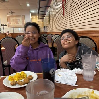 No 1 China Buffet - two people sitting at a table with plates of food - Chinese Near Me - Kennett, Missouri