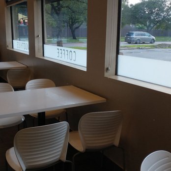 Magic Cup - White chairs with white tables - Coffee & Tea Near Me - Houston, Texas