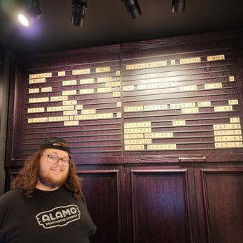 Alamo Drafthouse Cinema Indianapolis - I met a new friend. He was very helpful. Look at the movies on the scrabble board. - Cinema Near Me - Indianapolis, Indiana