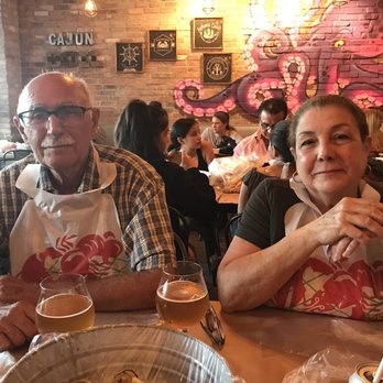 Cajun Boil - My mother and father in law ready to dig in - Cajun/Creole Near Me - Miami, Florida