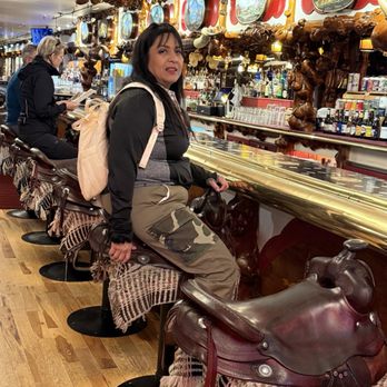 Million Dollar Cowboy Bar - Saddle bar stools. - Bars Near Me - Jackson, Wyoming Million Dollar Cowboy Bar - Saddle bar stools. - Bars Near Me - Jackson, Wyoming