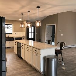 Newman Homes - Another new custom house built by Newman Home's, a Custom home building general contractor. New shingle roof and vinyl siding.