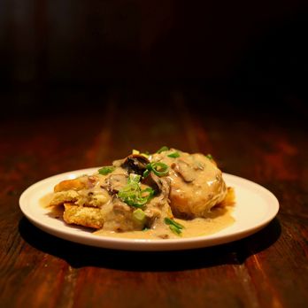 Twilight Room - Rich buttery biscuits smothered in creamy mushroom gravy topped with fresh green onions. - Dive Bars Near Me - Portland, Oregon