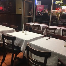 tables and chairs in a restaurant tables and chairs in a restaurant