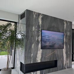 Blackstone Granite & Marble - Mercury Gray Quartzite Fireplace Surround