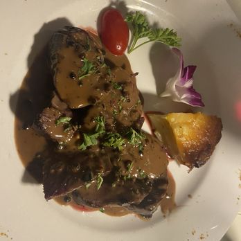 La Sirene - Seared Hanger Steak au Poivre - French Near Me - New York, New York La Sirene - Seared Hanger Steak au Poivre - French Near Me - New York, New York