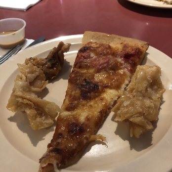 Tin Tin Buffet Restaurant - Pizza garnished with honey-soaked fried wontons. - Buffets Near Me - Brighton, Massachusetts Tin Tin Buffet Restaurant - Pizza garnished with honey-soaked fried wontons. - Buffets Near Me - Brighton, Massachusetts