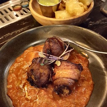 Amaru - Bacon wrapped plantains with chorizo and sofrito - Latin American Near Me - Chicago, Illinois Amaru - Bacon wrapped plantains with chorizo and sofrito - Latin American Near Me - Chicago, Illinois