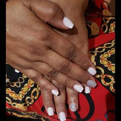 Be One Nails & Spa - Paolo does my dip powder and is very very neat and clean.  I come in and tell him what I want and he always nails it!!!