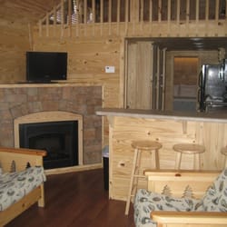 The Cabins On Highport Road - The Lighthouse has a queen bed, regular fold out in living room, and large sleeping loft.