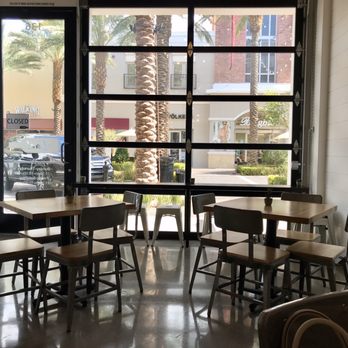 The Local - The front area with tables and stools for seating. - Wine Bars Near Me - Henderson, Nevada The Local - The front area with tables and stools for seating. - Wine Bars Near Me - Henderson, Nevada
