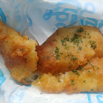 Garbo’s - Close up of the broken piece of huge fish. - Seafood Near Me - Austin, Texas