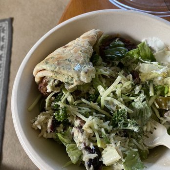 CAVA - Sad, soggy pita packed into the bowl and bowl missing half the selected toppings. - Salad Near Me - El Segundo, California