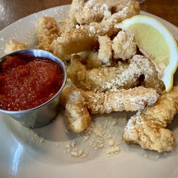 River City Grille - Calamari fingers topped with cheese - American Near Me - Marble Falls, Texas River City Grille - Calamari fingers topped with cheese - American Near Me - Marble Falls, Texas