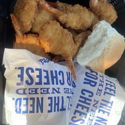 Shrimp dinner basket with fries and cheese curds Shrimp dinner basket with fries and cheese curds