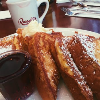 Russell's - A thousand times YUM! French toast with warm syrup and creamy butter accompanied by some hot coffee #winning - American Near Me - Pasadena, California
