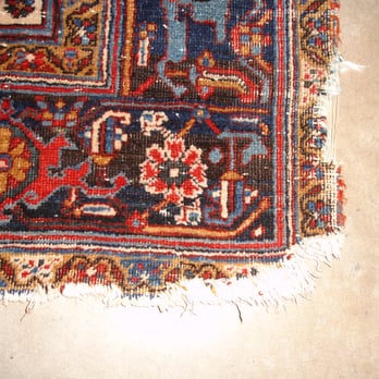 Austonian Rug Cleaning - Corner damage on an old Heriz rug - Rugs Near Me - Austin, Texas